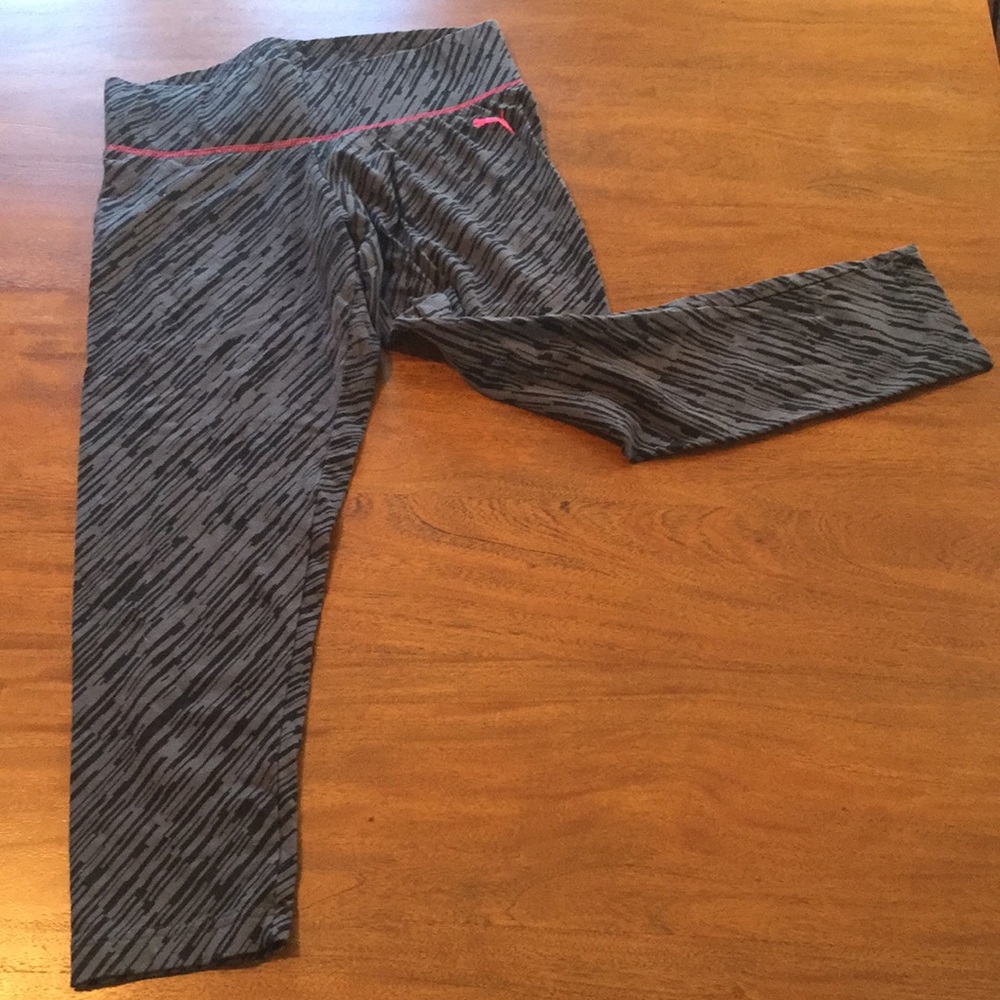 Black and gray Puma Capri workout tights